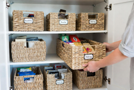 Organised Kitchen Cupboard With Labeled Baskets.jpg